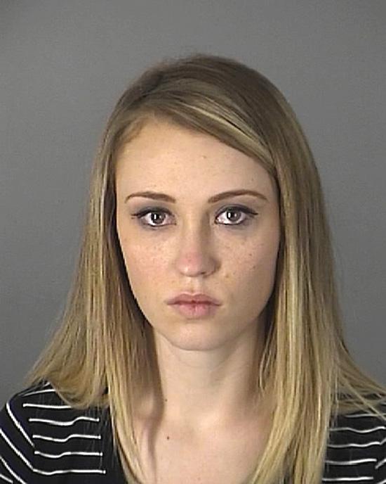 Arrested for grand theft.