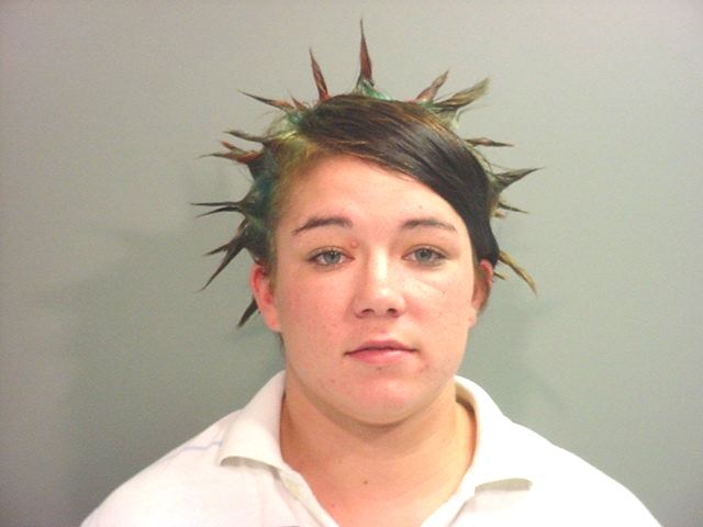 Arrested for a violation of her suspended sentence.
