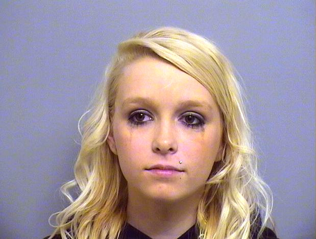 Arrested for failing to pay court costs after having an improper license plate.